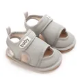 Close-up of grey breathable mesh baby sandals with soft sole and baby label velcro strap - 11cm / Gray