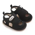 Close-up of black mesh baby sandals with baby text on the strap - 11cm / Black