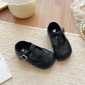 Classic black T-strap girls leather shoes with elegant brogue detailing and soft sole - Black
