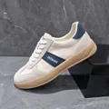 Men's stylish leather and fabric patchwork GAT sneakers in cream white and navy blue - White