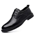 Classic black leather business dress shoes with crocodile texture and lace-up design. - Black