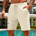 Détail de ce short en maille gaufrée beige pour homme avec taille élastiquée à cordon - Abricot