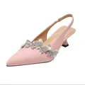 Elegant pink pointed-toe slingback heels with sparkling rhinestone butterfly decor. - Pink