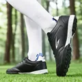 Black TF turf soccer shoes with breathable design for youth training and matches. - 35 / White Black