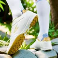 Professional TF turf soccer shoes with breathable white leather and gold accents - 35 / Platinum