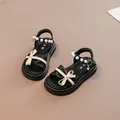 Eleganti sandali da principessa neri per bambina con cinturini in perle e fiocchi bianchi - 23 / Nero
