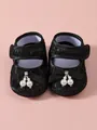 Detail view of black lace baby girl princess shoes featuring pearls and bow accents - Size 11 (Inner Length 10.5cm) / Black