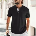 Detail of black Henley shirt with contrast white placket and chest pocket - S / Tops / Black