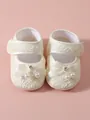 Elegant cream lace baby princess shoes featuring silk ribbon bow and pearl detail - Beige