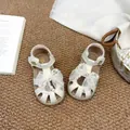 Close-up of white girls' princess sandals with elegant pearl bow and mesh detail - 21 (Inner Length 14cm) / Off White