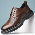 Men's stylish brown business casual leather shoes featuring perforated sides and lace-up closure - Hollow Brown
