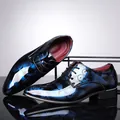 Close-up of glossy blue floral pattern on men's business oxfords with a mirror finish. - 38 / Blue