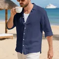 Detail of a navy blue linen long sleeve shirt for men in a casual beach setting. - S / Top (SK-015) / Navy Blue