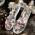 Detailed macro view of floral flat sandals with elegant fabric flower and crystal accents. - 35 / Silver