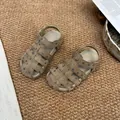 Primer plano de sandalias romanas con lunares para niña y suela blanda transpirable - 23 (Longitud Interior 15.0cm) / Caqui