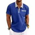 Detail shot of men's blue waffle knit polo shirt with grey contrast collar and pocket - S / Tops / Sapphire Blue