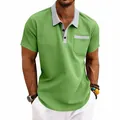 Close-up detail of men's waffle knit polo shirt with contrast collar and pocket - S / Tops / Fruit Green