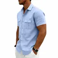 Vista lateral detallada de una camisa de lino azul claro para hombre con bolsillos - S / Tops / Azul claro