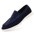 Vintage navy blue suede loafers for men featuring a comfortable white rubber sole - Blue
