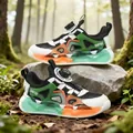 Breathable mesh children's sneakers with quick-dial lacing system in forest setting - 28 / Black Orange