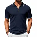 Macro detail of navy blue heavyweight jacquard polo shirt with silver zipper closure. - Navy Blue