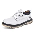 Detailed side view of men's white leather mid-top work boots featuring a rugged lug sole - 38 / White