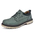 Detail view of stylish men's teal nubuck work boots featuring a durable lug sole - 38 / Green
