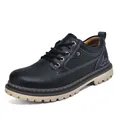 Detailed side view of black leather work boots with Salkin branding and tan sole - 38 / Black