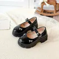 Elegant black retro platform Mary Jane shoes featuring a rhinestone bow and buckle strap - 26 / Black