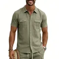 Detail view of men's olive green linen short-sleeve shirt with functional chest pockets. - S / Tops / Army Green