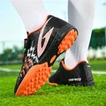 Anti-slip children's turf soccer shoes in black and orange with easy velcro strap closure - 30 / Black Orange