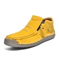 Detail shot of bright yellow high-top casual leather shoes featuring a side zipper closure - 36 / Yellow
