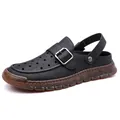 Premium men's black perforated leather clogs with adjustable strap and anti-slip brown sole - Black