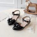 Elegant black patent leather girls sandals featuring a large rhinestone bow decoration. - Size 27 (17cm) / Black