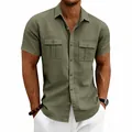 Close-up of olive green men's linen short-sleeved shirt with workwear pockets - S / Tops / Army Green