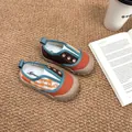 Close-up of vintage color-block children's canvas shoes with soft soles on a brown rug - 22 (Inner Length 14cm) / Plaid Orange