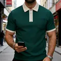 Detail of men's green zip polo shirt with textured fabric and contrast collar. - S / Tops / Army Green