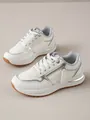 Zapatillas modernas de mujer en blanco y plata con cremallera lateral y suela goma - Blanco