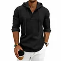 Close-up of black waffle knit hooded Henley shirt for men with three-button placket. - S / Tops / Black