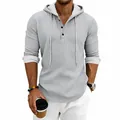 Detail view of a men's light grey waffle knit hoodie with a buttoned Henley neck design - S / Tops / Light Gray