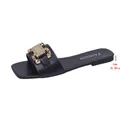 Close-up detail of 1cm flat sole and stylish gold decorative buckle on black sandal - 35 / Black