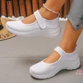 Detail of breathable white mesh Mary Jane flats with 3.8cm heel on model feet. - 36 / Mary Jane Style / White
