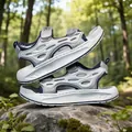 Boys' breathable gray and navy sports sandals displayed on a natural mossy rock - 27 / Sport Sandals (25324) / Ink White