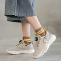 Baskets de sport beiges pour enfants avec système de boucle rotative mixte - Crème