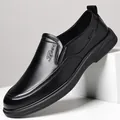 Black business casual leather loafers with slip-on design and sport engraving detail - Season Black