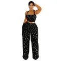 Ensemble deux pièces élégant pour femme avec haut licou à pois et pantalon à franges. - Noir