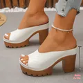Side view of white platform mules with 10.5cm chunky heel and quilted upper texture. - 35 / White