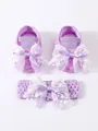 Detailed close-up view of purple baby shoes and lace headband set for newborn girls - Purple