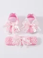 Detail view of pink newborn shoes and matching lace headband set with satin bows - Size 11 (Inner Length 10.5CM) / 26-016 Style Set / Pink