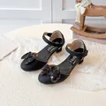 Eleganti scarpe da principessa nere per bambine con fiocchi di paillettes e cinturino alla caviglia - Nero